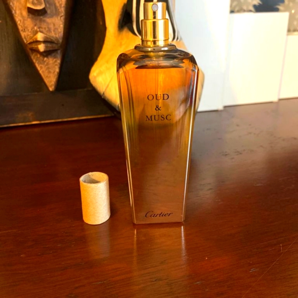 Cartier les heures voyageuses oud and musc
